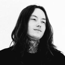 Old picture of Noah Sebastian with long hair